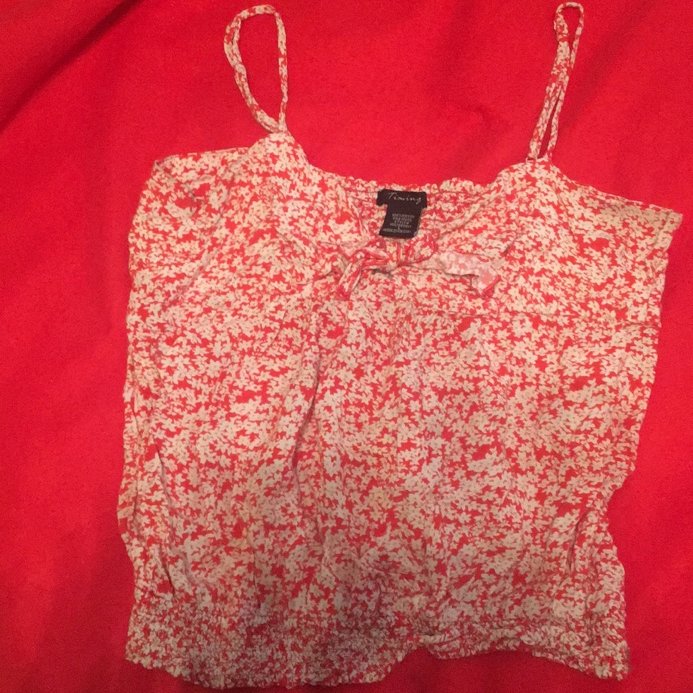 Tank/ it’s a large but fits as a small -medium